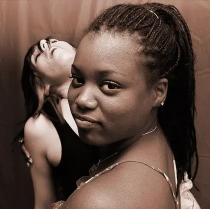 two women, one in focus in the foreground, the other out of focus in the background